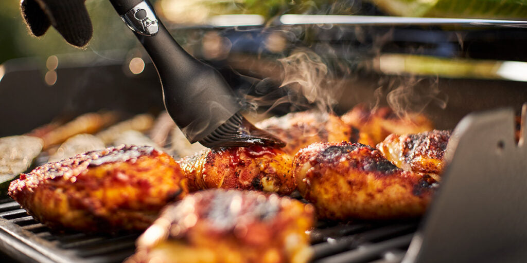 Basting Chicken Cooking on a BBQ