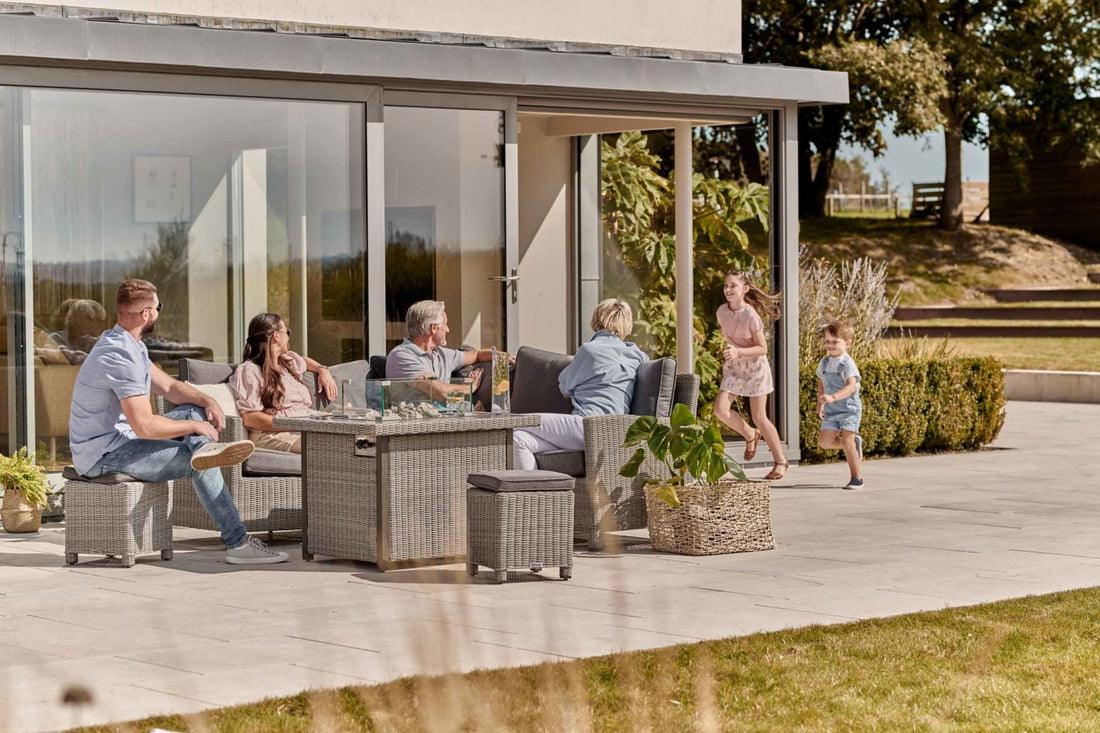 Family sitting on a Garden Furniture Set