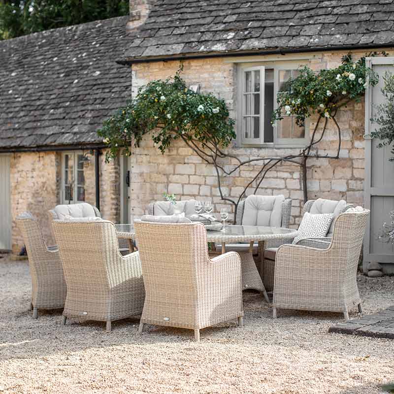 Bramblecrest Chedworth 8 Seat Outdoor Dining Set in Sandstone with Elliptical Table, Lazy Susan, Parasol &amp; Base image 0