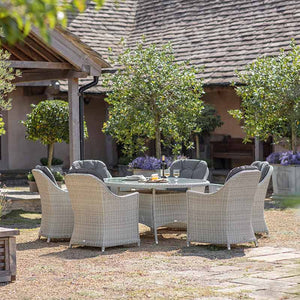 Bramblecrest Monterey 6 Seat Garden Dining Set in Dove Grey with Elliptical Table, Parasol & Base image 1