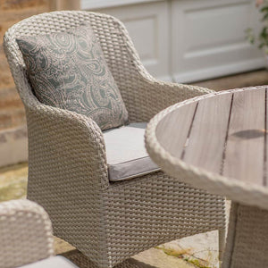 Bramblecrest Tetbury 4 Seat Round Outdoor Dining Set in Nutmeg Weave with Parasol & Base image 1