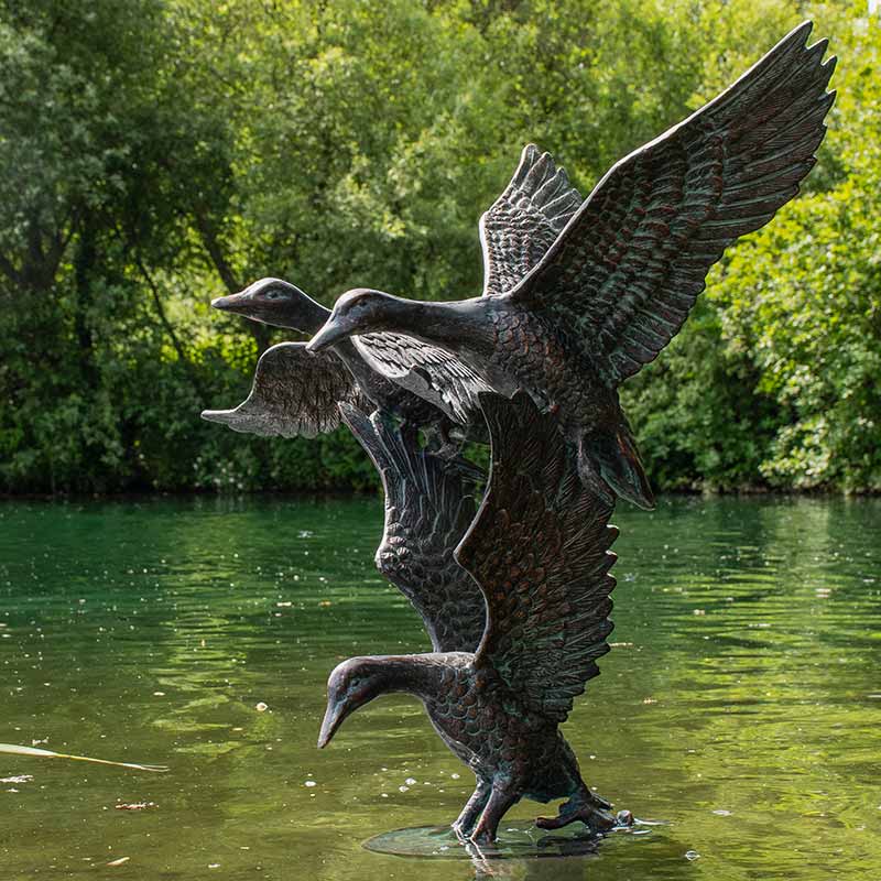 Home & Garden UK Three Flying Ducks Garden Statue image 0