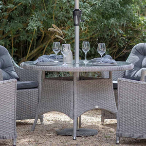 Bramblecrest Wentworth 4 Seat Garden Dining Set in Pewter Rattan with Round Table, 2.5m Crank Parasol & 15kg Base image 1