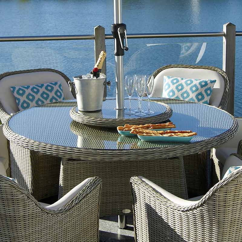 Bramblecrest Monte Carlo 6 Seat Garden Dining Set with Round Table, Parasol & Base image 0