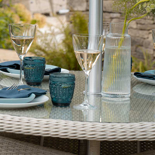 Bramblecrest Monterey 4 Seat Garden Dining Set in Dove Grey with Round Table, Parasol &amp; Base image 3