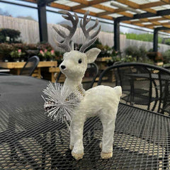 Beautiful christmas frost dusted woodland stag