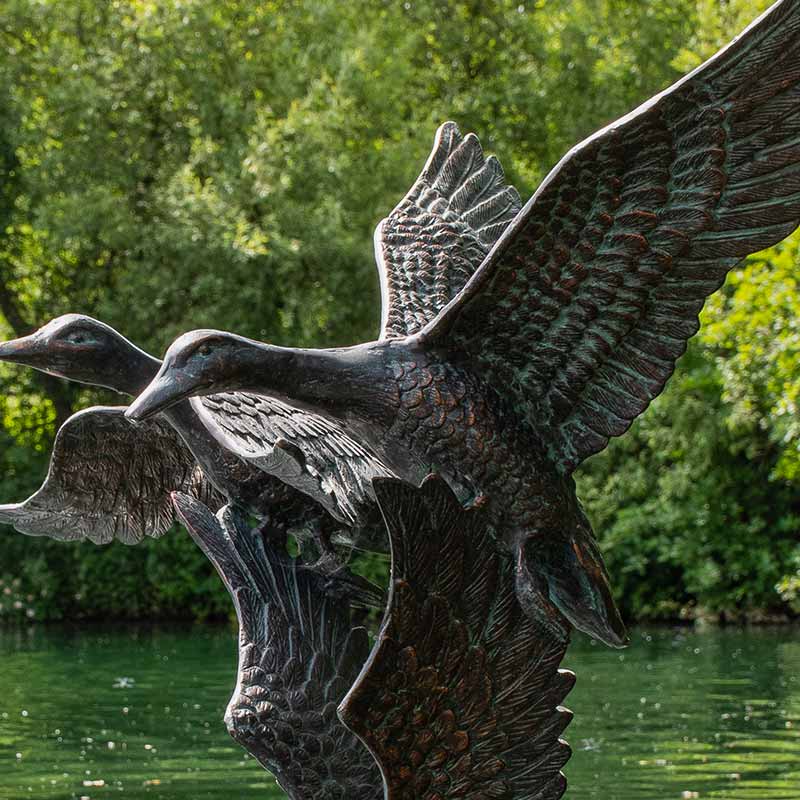Home & Garden UK Three Flying Ducks Garden Statue image 0