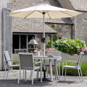 Bramblecrest Zurich 4 Seat Dining Set in Mocha with Round Table, 2.5m Parasol & Base image 0