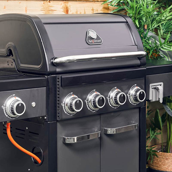 Black grill with Grillstream logo on a wooden background