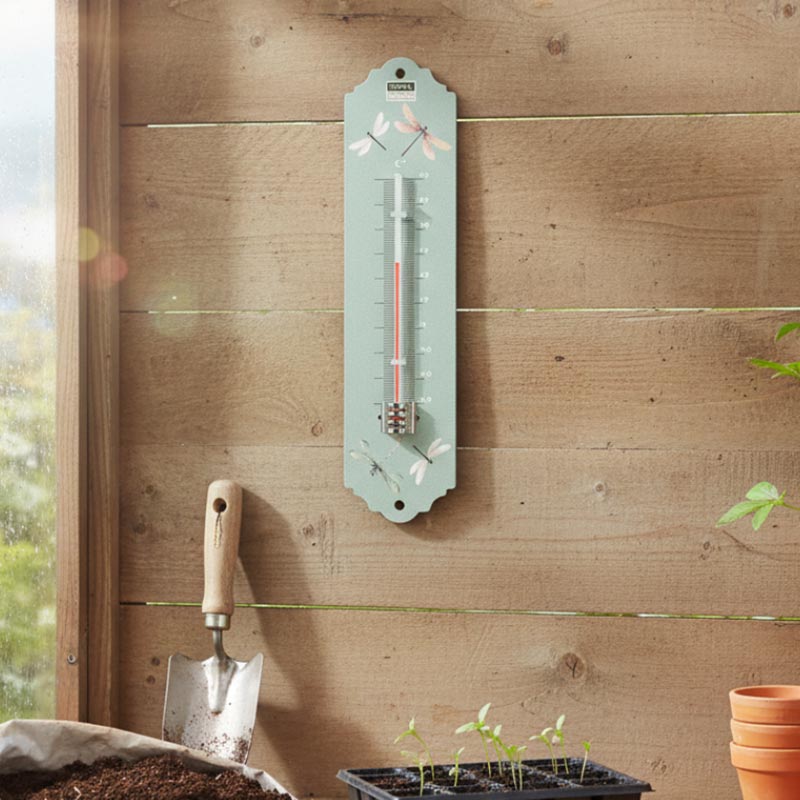 A Town & Country garden wall thermometer with a pale mint green background and dragonfly illustrations.