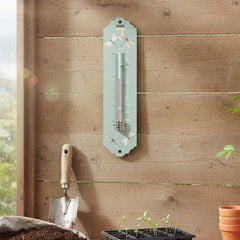 A Town & Country garden wall thermometer with a pale mint green background and dragonfly illustrations.