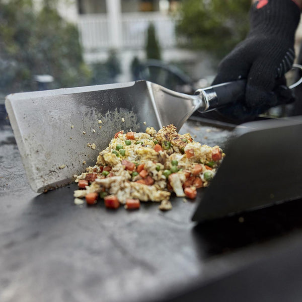 Weber Griddle Spatula in use cooking omlette