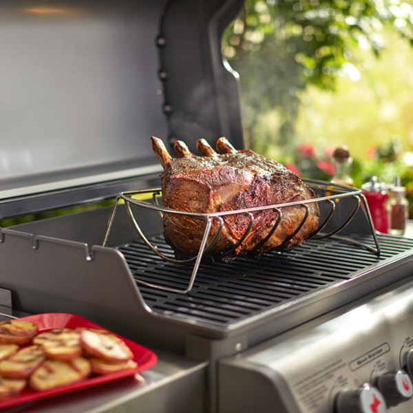 Use the Weber Barbecue Premium 2-in-1 Grilling Rack (Reversible) #6469 to prepare a juicy joint of meat