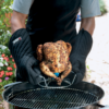 The Weber Poultry Roaster is easy to handle