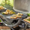 Cook delicate food on the Weber Barbecue Cast Iron Griddle for Q 200 / 2000 Series