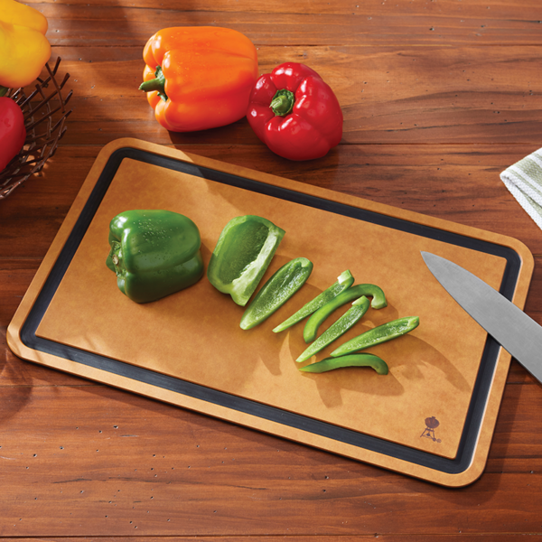 Chop vegetables on the Weber Cutting Board