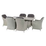Bramblecrest Monterey 6 Seater Dining Set with Ceramic Firepit Table tucked away