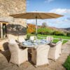 Bramblecrest Monterey 8 Seat Oval Dining Set with Lazy Susan, Parasol & Base in Sandstone
