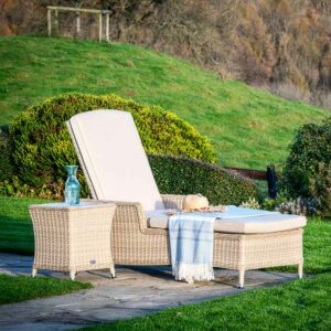 Bramblecrest Monterey Sun-Lounger & High Coffee Table with Ceramic Top in Sandstone in garden