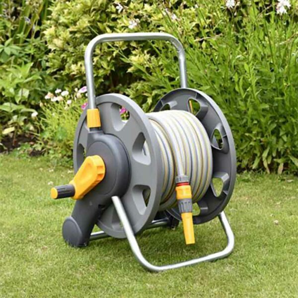 Hozelock Assembled 2-in-1 Hose Reel with 25m hose & nozzle in use
