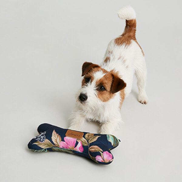 Joules Botanical Floral Comfort Bone Dog Toy lifestyle with dog playing