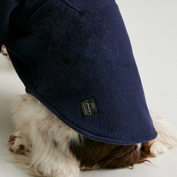 Joules Navy Dog Fleece lifestyle close up of fleece & branding