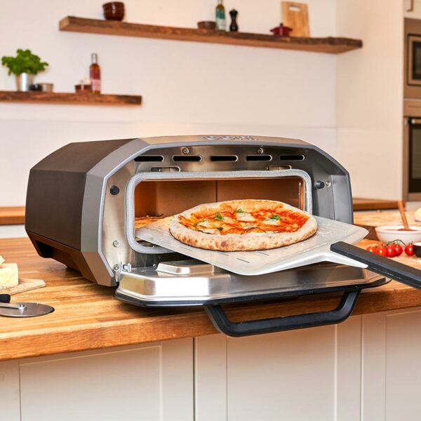 Ooni Volt 12 Electric Pizza Oven in use indoors
