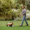 Stihl RLA 240 Cordless Lawn Scarifier in garden