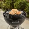 The Weber GBS Dutch Oven Duo on a charcoal BBQ
