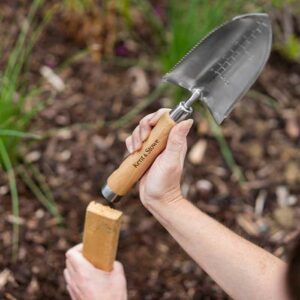 Using the hammer end of The Capability Trowel
