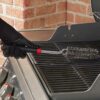Weber Detail Barbecue Brush cleaning cooking grate on gas BBQ