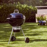 Weber Original Kettle E-5730 Charcoal Barbecue 57cm in Black in the garden