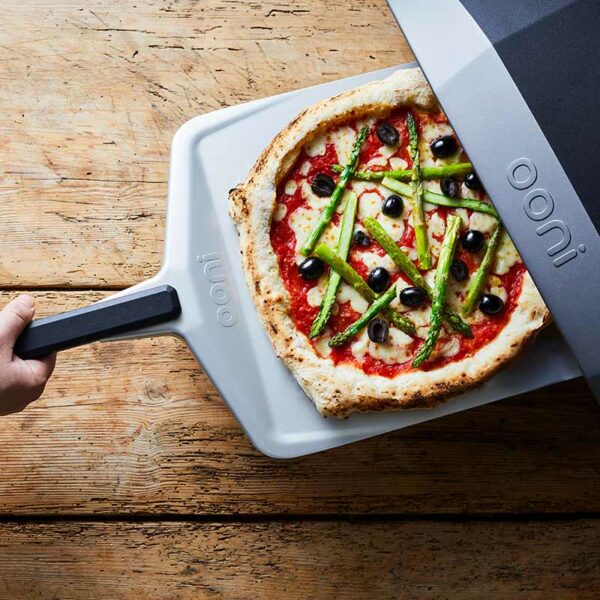 Ooni 12-Inch Pizza Peel with asparagus pizza