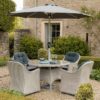 Bramblecrest Monterey 4 Seat Garden Dining Set in Dove Grey with Round Table, Parasol & Base