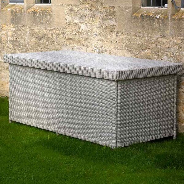 Bramblecrest Monterey Dove Grey Large Cushion Storage Box with Liner shown on lawn