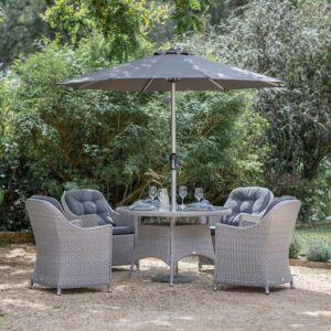 Bramblecrest Wentworth 4 Seat Outdoor Dining Set in Pewter Rattan with Round Table, 2.5m Parasol & Base