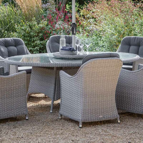 Bramblecrest Wentworth 8 Seat Elliptical Dining Table in Pewter Rattan with Lazy Susan, Parasol & Base