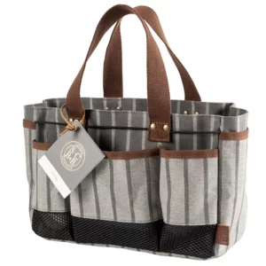A predominantly grey Burgon & Ball Sophie Conran Tool Bag with a Burgon & Ball label. The bag has raised brown handles.