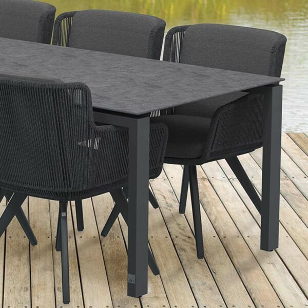 Close up of Goa Table with Flores Dining Chairs