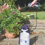 Defenders Multi-Purpose Pressure Sprayer (5 litres) spraying a pot