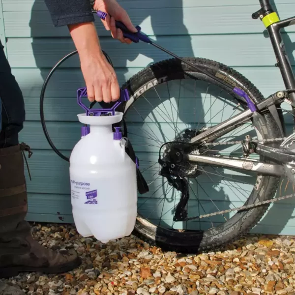 Defenders Multi-Purpose Pressure Sprayer (8 litres) cleaning a bike