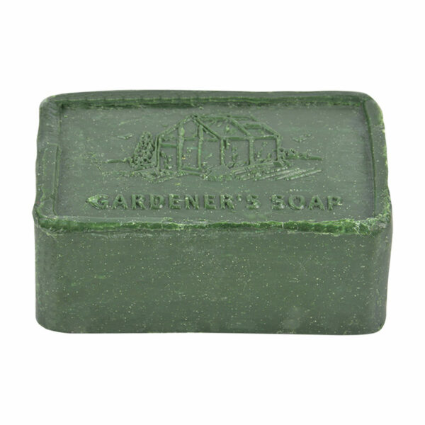 A green, rustic bar of gardeners soap.