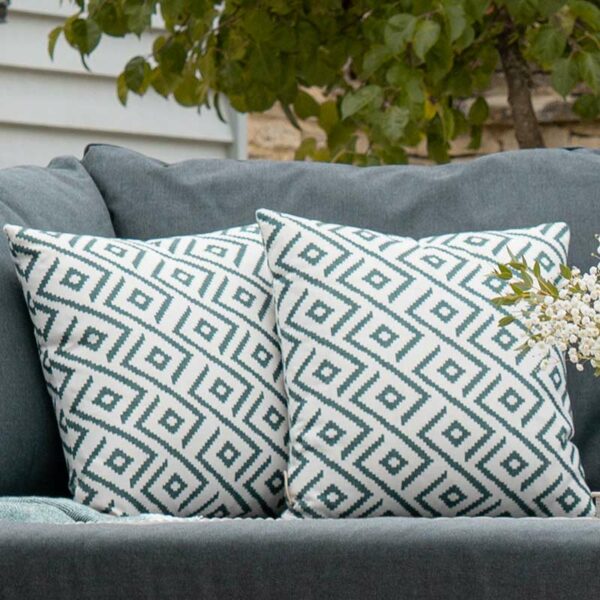 Green Geometric Square Scatter Cushion in use