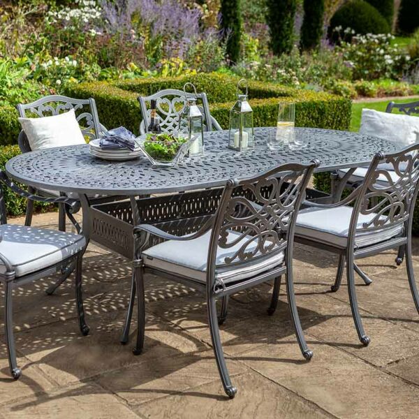 Hartman Capri 6 Seat Oval Dining Table Set in Antique Grey shown without parasol