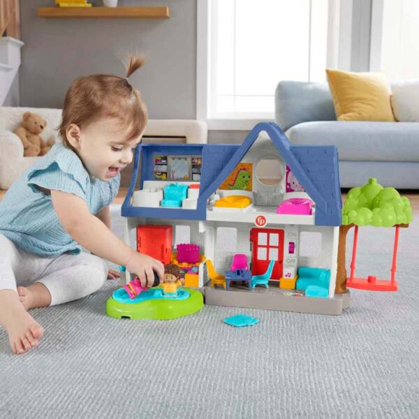 Fisher-Price Little People Play House Playset for Kids girl playing