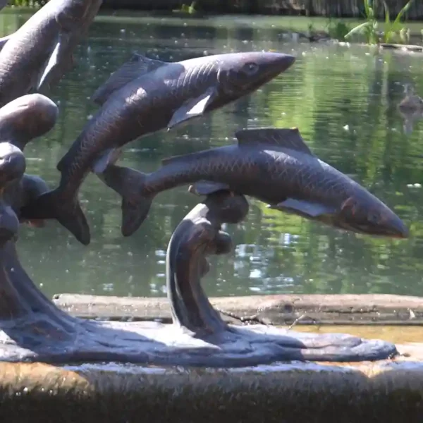 Lower detail of the Home & Garden UK Leaping Salmon Garde Statue