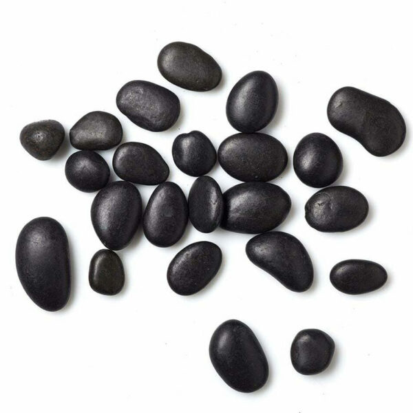 A cluster of scattered glossy black pot topper stones. The stones are rounded and smooth, between 15 and 35mm.
