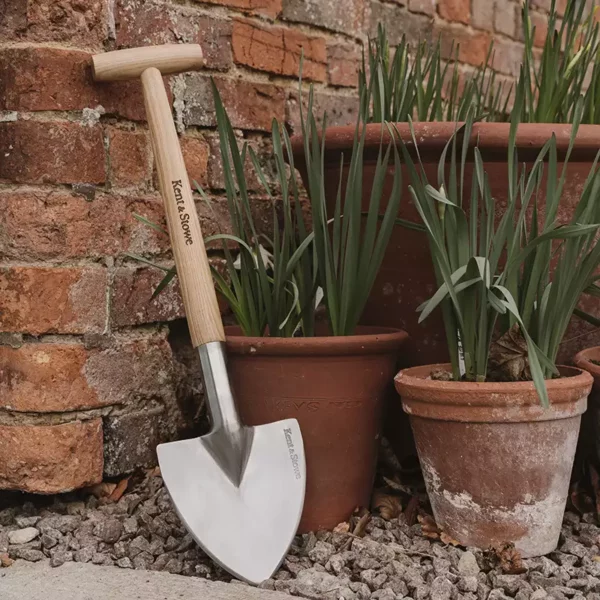 Kent & Stowe Perennial Spade leaning against wall