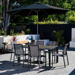 Supremo Leisure Livorno 6 Seat Garden Dining Set with Rectangular Table, Parasol & Base on patio