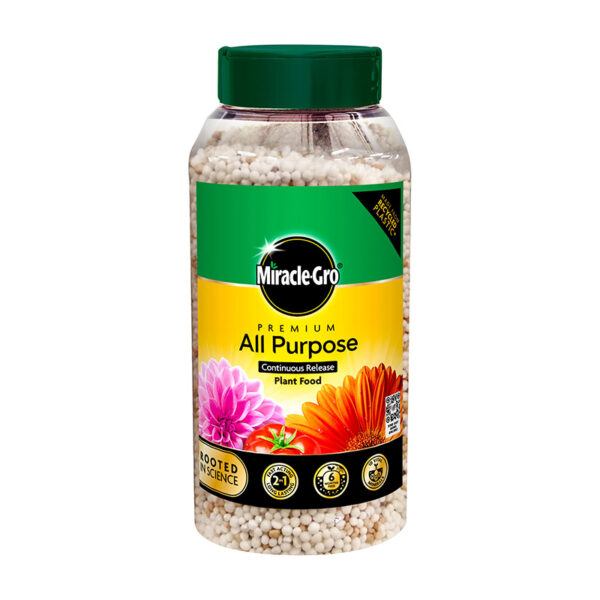 A 900g, transparent bottle of Miracle-Gro All Purpose Continuous Release Plant Food granules.